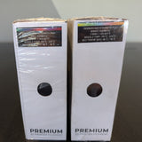 Two boxes of premium 3D printer filament on a dark surface